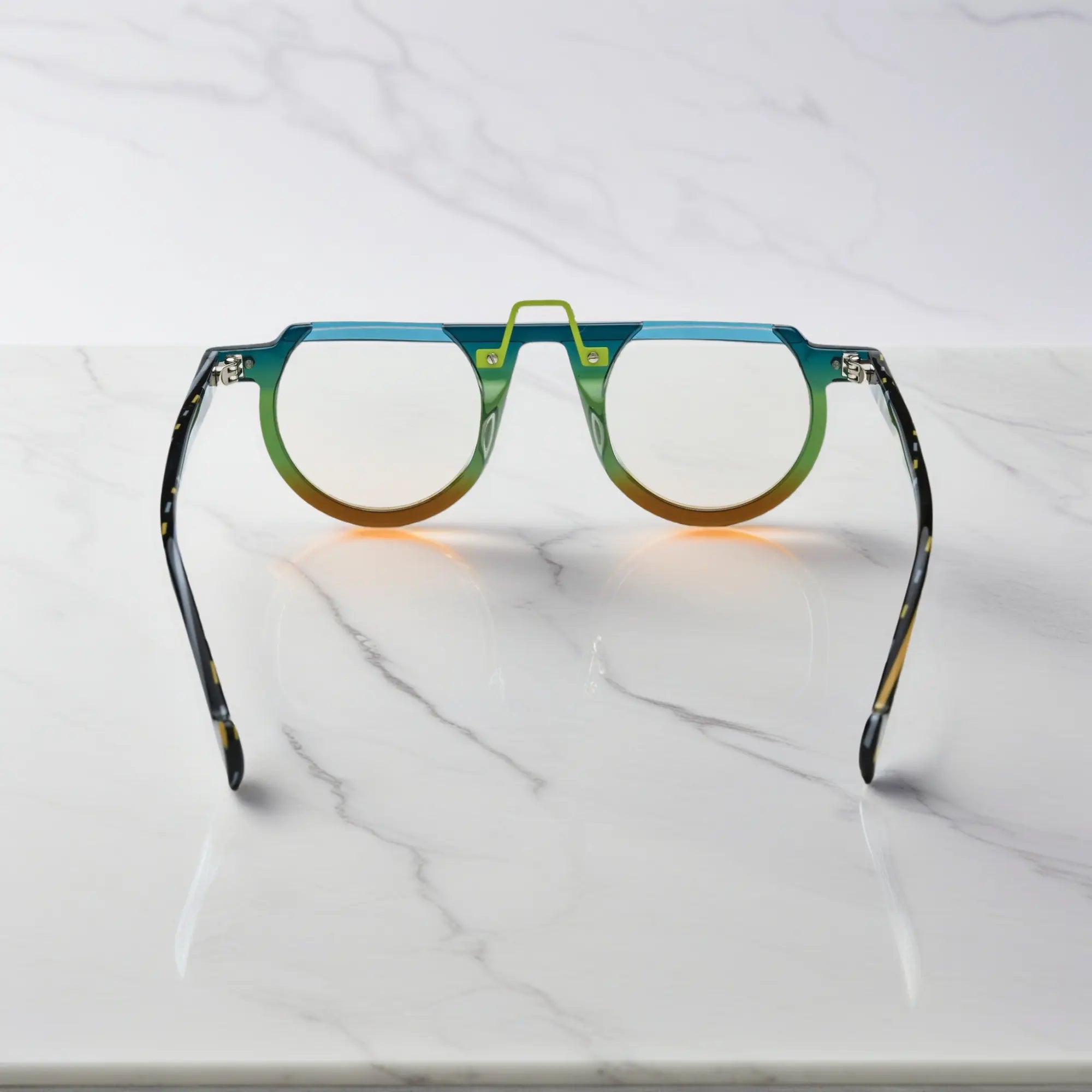 Rear view of VoyueLens™ VL19383 frame in a vibrant green and amber color blend